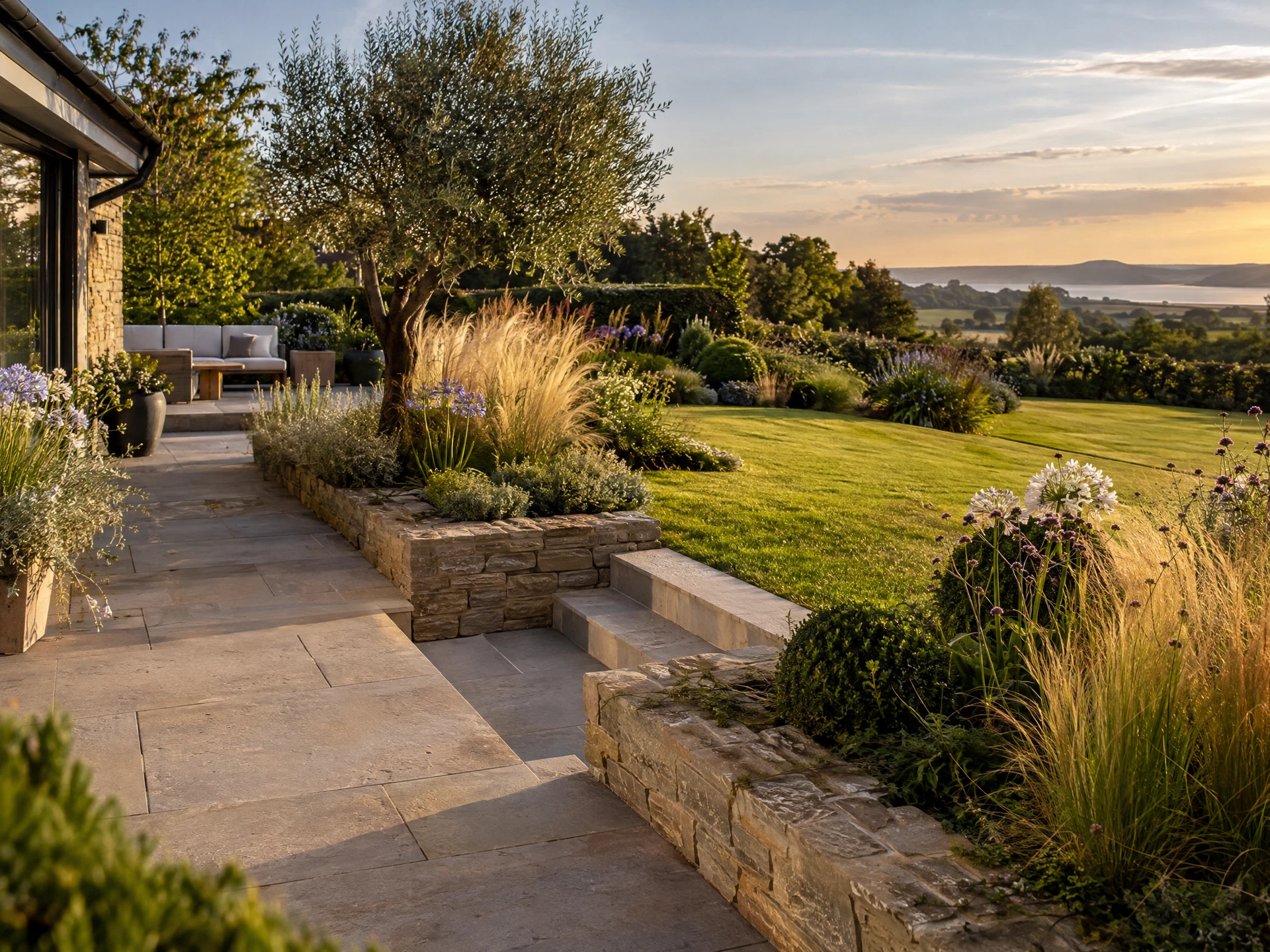 Finished garden with natural stone path and new planting